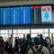 Passengers At Austin-Bergstrom International Airport In Austin, Texas. 
