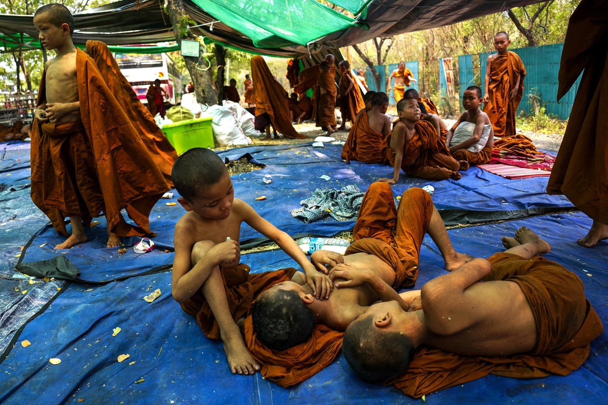 Novice monks are seen inside a shelter in a makeshift tent camp following a strong earthquake in Mandalay, Myanmar