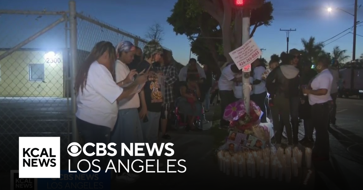 Friends and family hold vigil for mother and daughter shot to death in ...