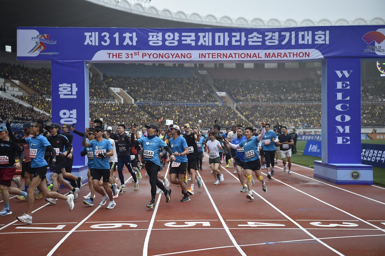 Participants take part in the 31st Pyongyang International Marathon at Kim Il Sung Stadium in Pyongyang, North Korea, April 6, 2025, as part of celebrations marking the birth of North Korea's founding leader Kim Il Sung in 1912