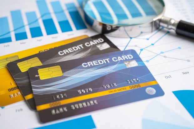 Credit card on chart and graph paper. Finance development, Banking Account, Statistics, Investment Analytic research data economy, Stock exchange trading, Business company concept. 