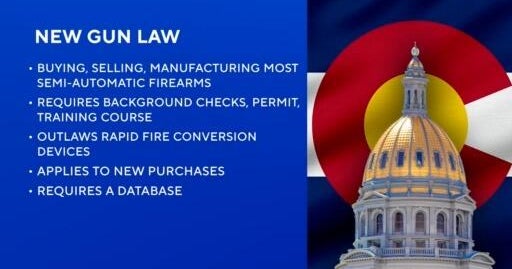 Colorado governor signs restrictive gun bill into law - CBS Colorado