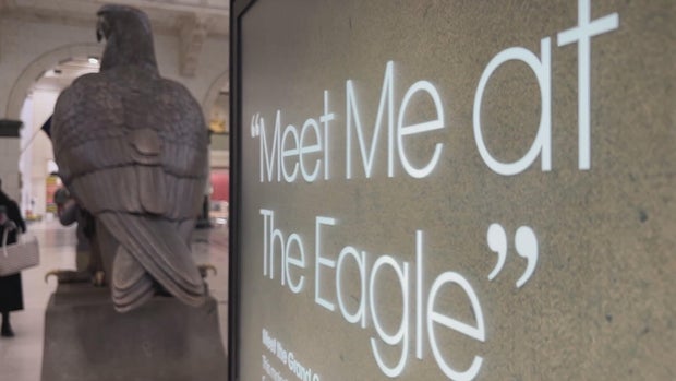 The eagle at the Wanamaker building and a sign that says Meet me at the Eagle 