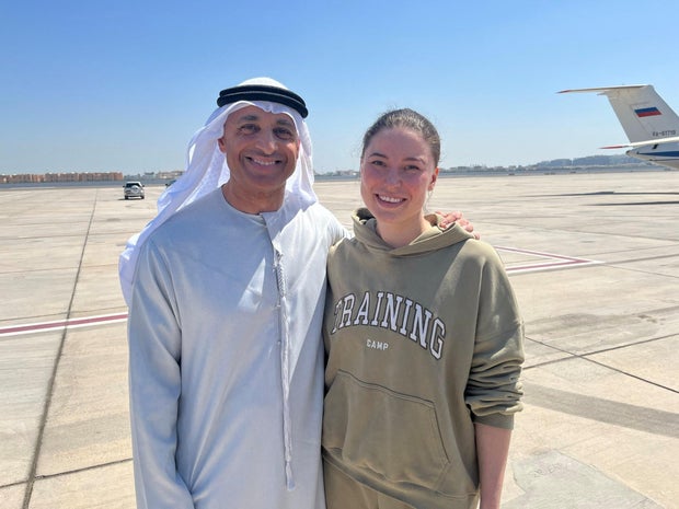 Yousef Al Otaiba, UAE Ambassador to the U.S., poses for a picture with Russian-American dual citizen Ksenia Karelina after being exchanged in a prisoner swap, at Al Bateen airport in Abu Dhabi 