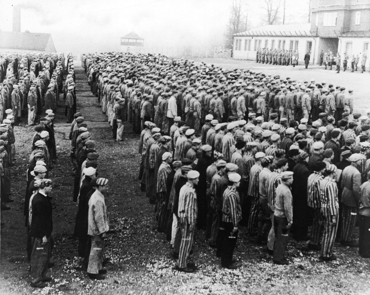 Polish prisoners are seen standing before Nazi officers in roll call square at the Buchenwald concentration camp, near Weimar, Germany,