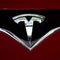Tesla design flaws caused crash that killed woman, injured husband, suit claims