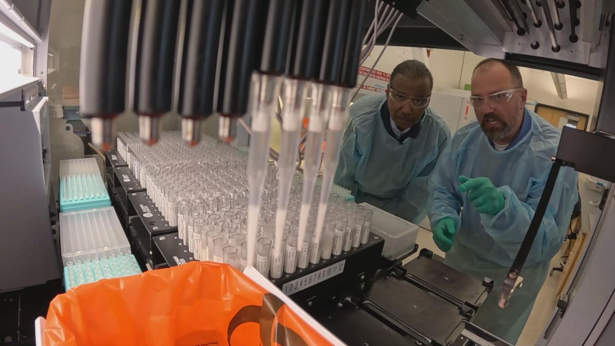 Bill Whitaker and Dr. Keith Poulsen