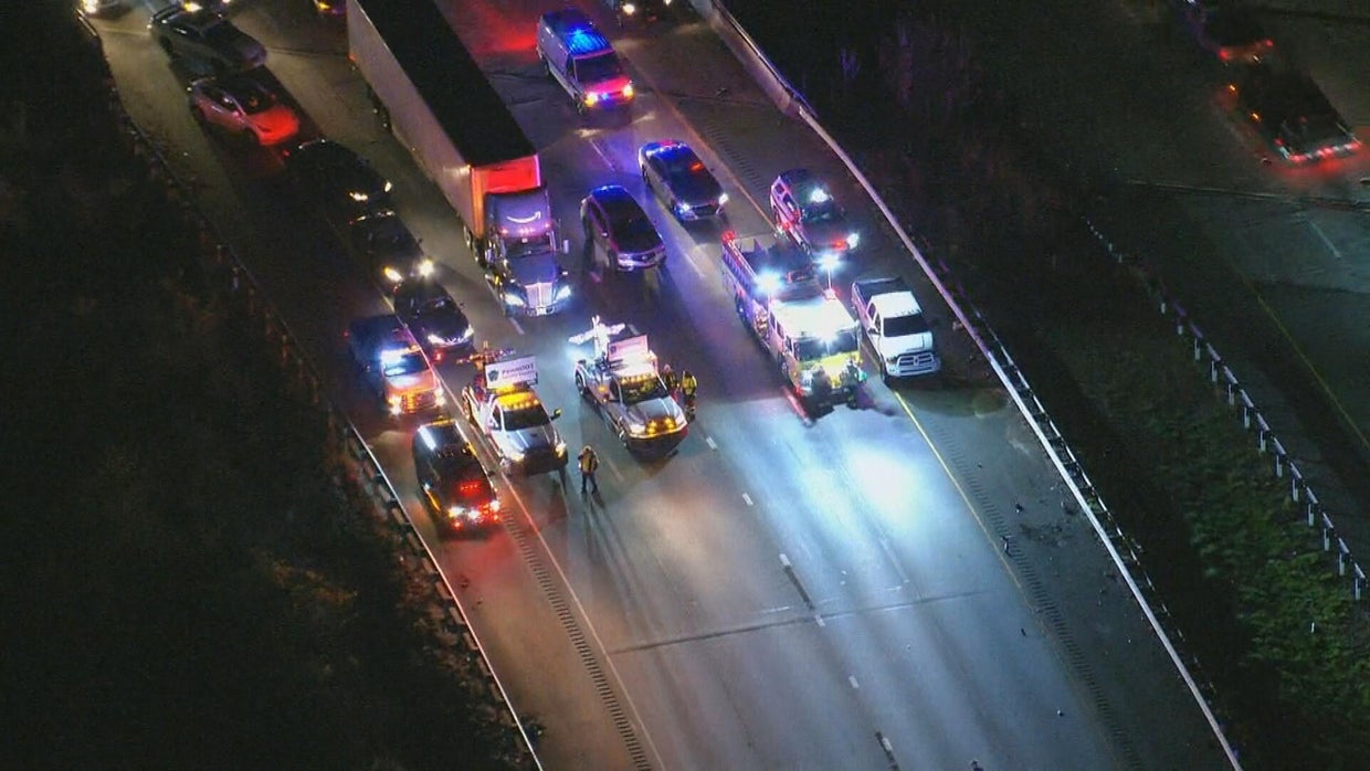 Emergency vehicles with their lights on stop traffic on 96 South in Delaware County