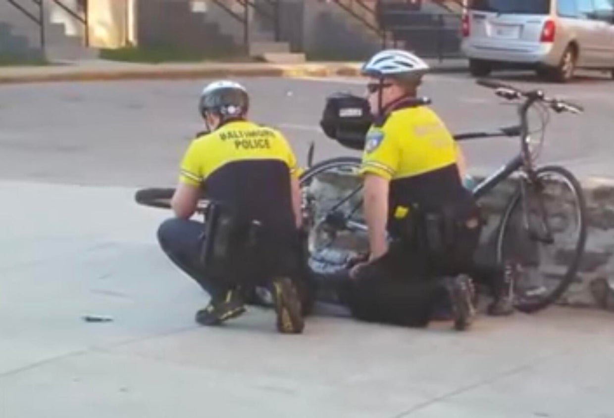 Freddie Gray placed into a police van in Baltimore 