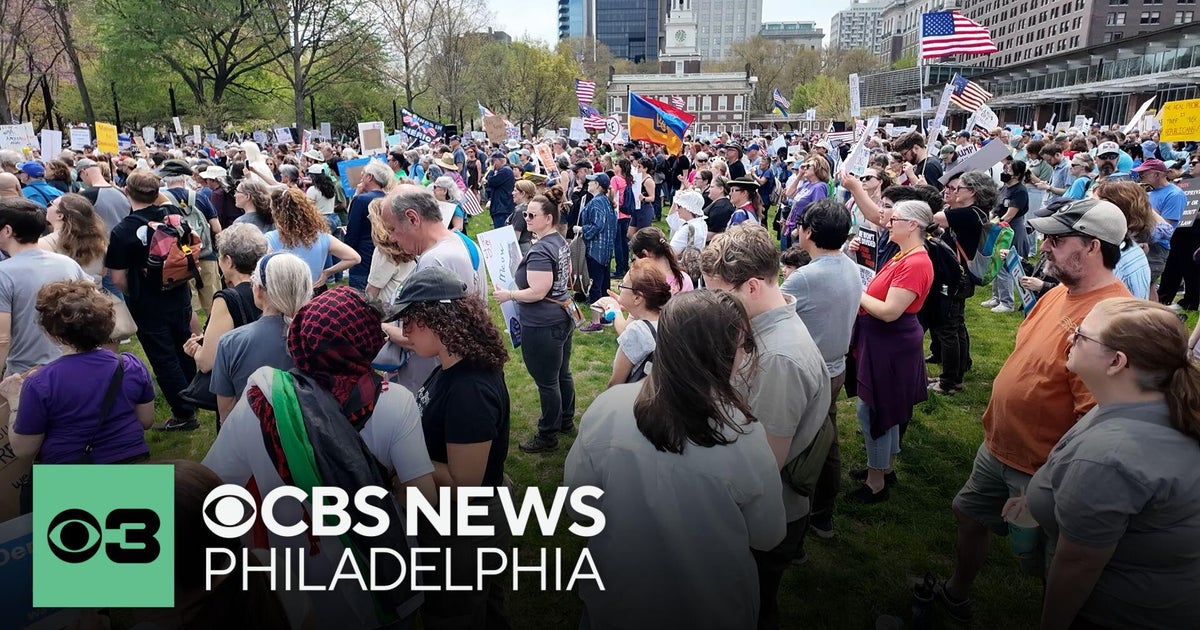 Protesters rally against Trump administration's policies in ...