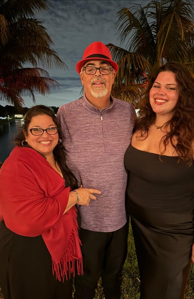 robert-morales-with-wife-and-daughter.jpg 