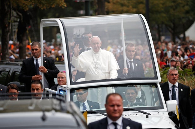 Pope Francis Rides To Mass On Parkway In The Popemobile 