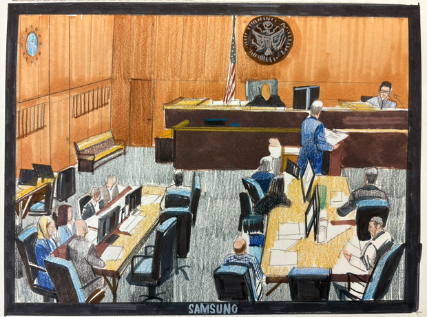 peter-on-stand-wide-with-his-attorney.png 