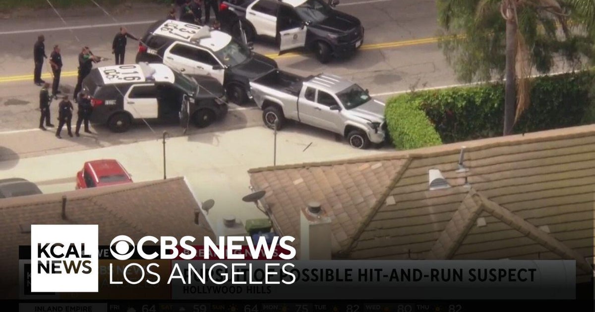 Los Angeles police standoff with pursuit suspect following a slow-speed ...