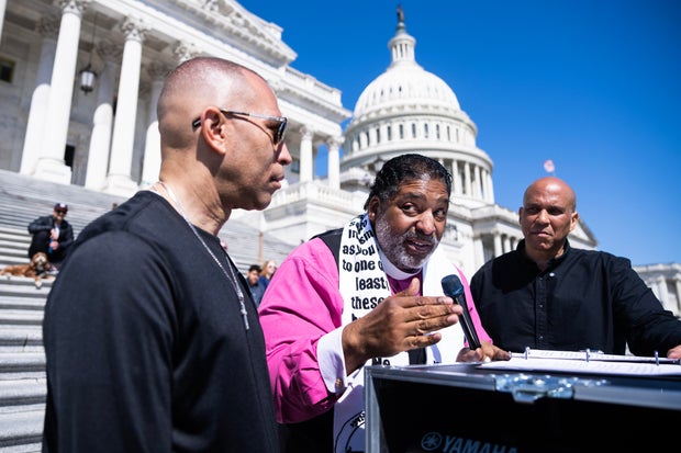 The minority leader of the House of Representatives, Hakeem Jeffries, Reverend Dr. William Barber and Senator Cory Booker, conduct a conversation broadcast live with Americans focused on