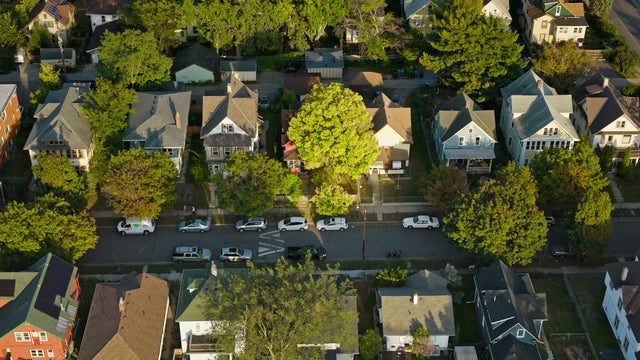 High Angel Aerial Shot of Cars Parked on Neighborhood Street in Minneapolis 