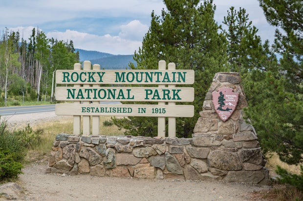 Sign near entrance to Rocky Mountain National Park in Colorado