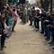 Hundreds form a human chain to move a Michigan bookstore by hand