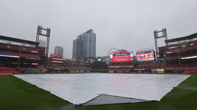 A tarp covers the field after the game between the St. Louis Cardinals and the New York Mets was postponed due to inclement weather at Busch Stadium on May 3, 2025 in St Louis, Missouri. 