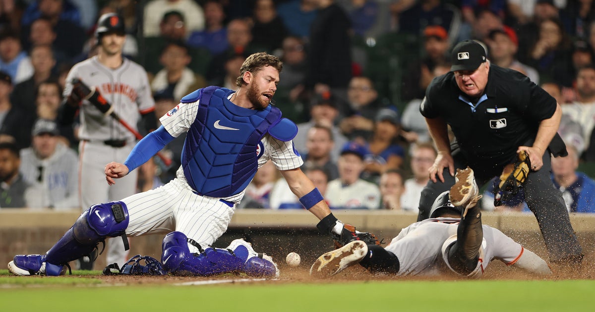 Giants score 9 runs in 11th inning, defeat Cubs 14-5