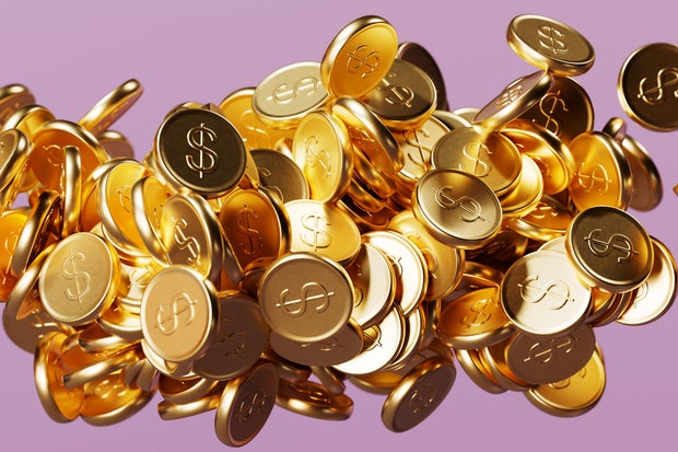 Digitally generated image of abstract background with gold dollar coins