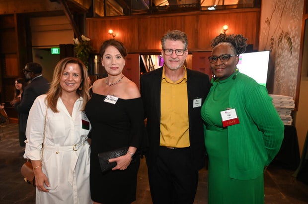 People pose for a photo at the Philabundance event 