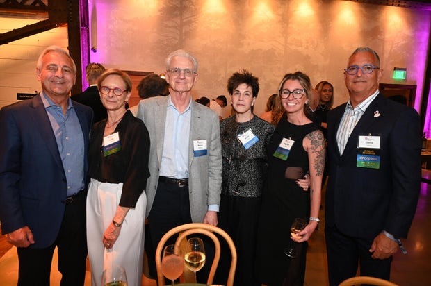 People pose for a photo at the Philabundance event 