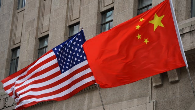 The national flags of the United States and China 