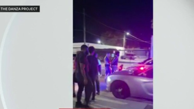 Police car with focus on siren lights. Beautiful siren lights activated in full mission activity. Policemen with patrol car in intervention operation at crime place. Emergency lights flashing on patrol car. 