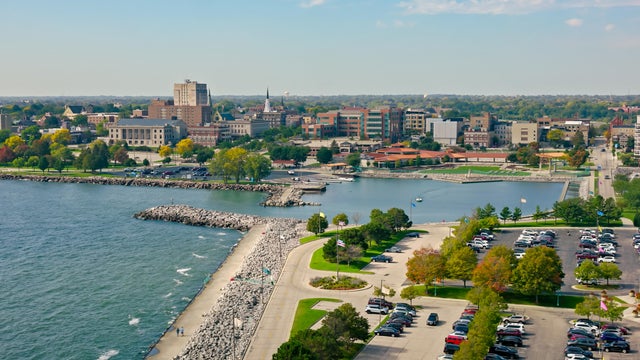 Aerial Shot of Racine, Wisconsin from over Lake Michigan in Fall 