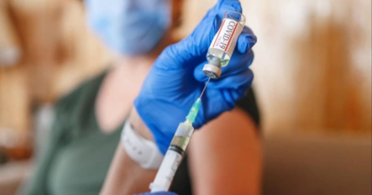 Health experts fear potential public health impacts from RFK Jr. halting COVID vaccine recommendations for kids, pregnant women
