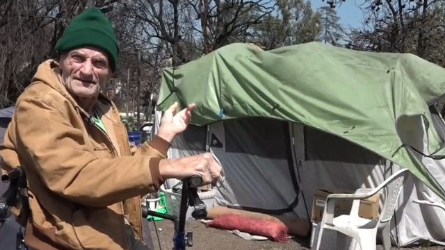 man-living-in-tent.png 