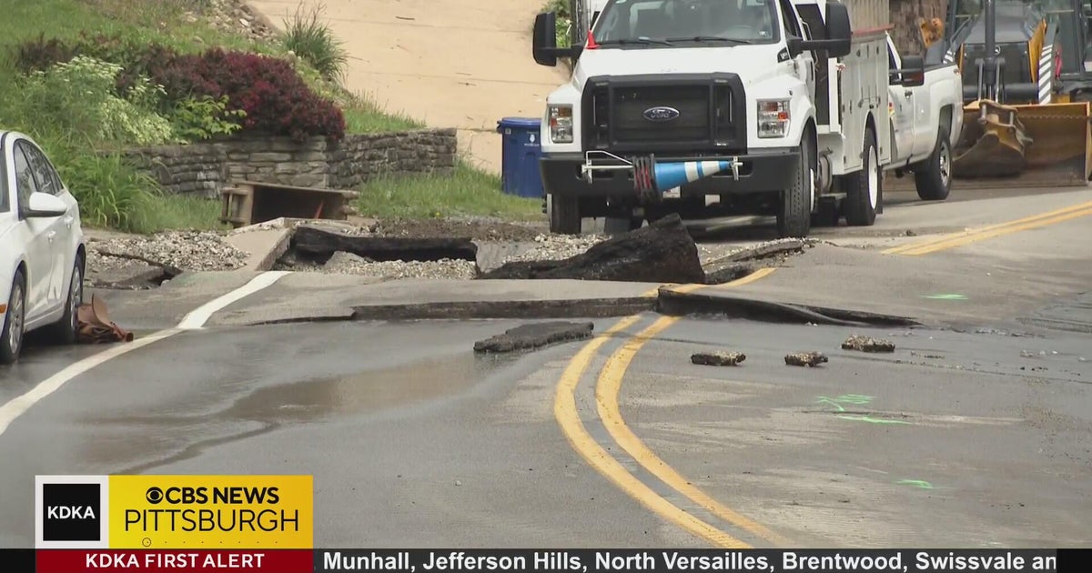 Large water main break floods road in Pittsburgh's Banksville ...