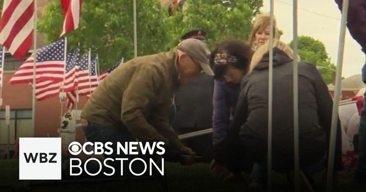 Massachusetts community plants flags to honor fallen soldiers for Memorial Day weekend