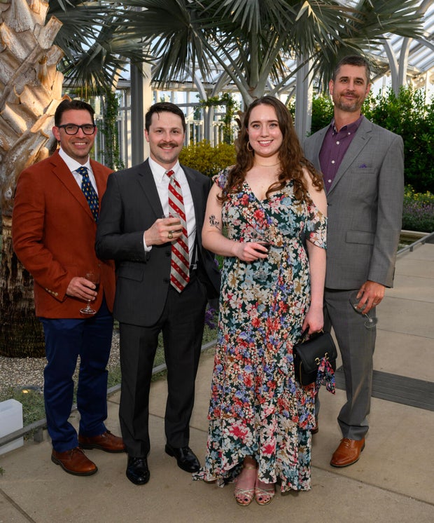 People pose for a photo at a gala for Nemours 