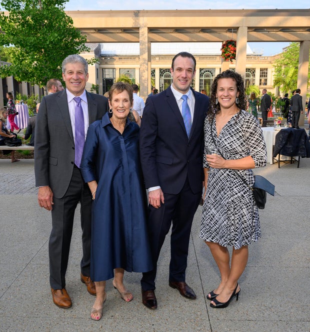 People pose for a photo at a gala for Nemours 
