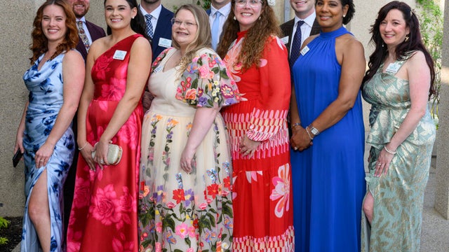 People pose for a photo at a gala for Nemours 