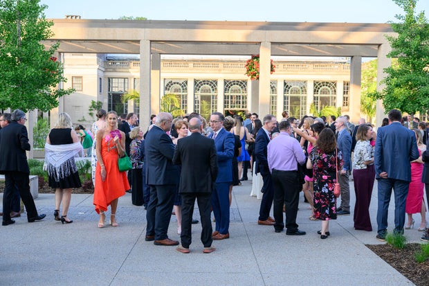 People pose for a photo at a gala for Nemours 