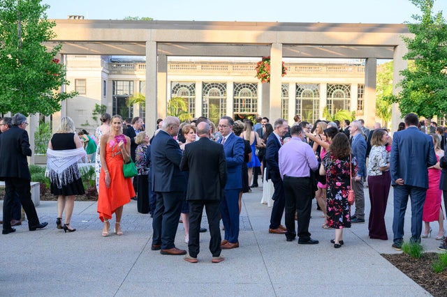 People pose for a photo at a gala for Nemours 