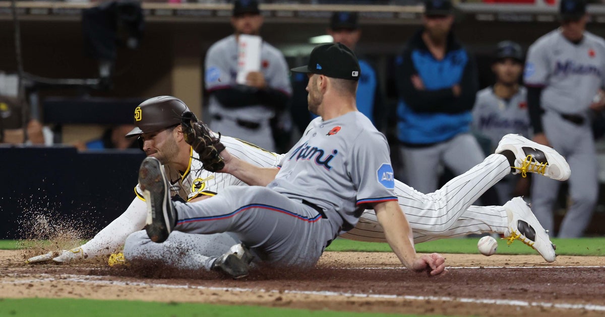 San Diego Padres rally past Miami Marlins in 11 innings after Machado homer, wild pitch walk-off