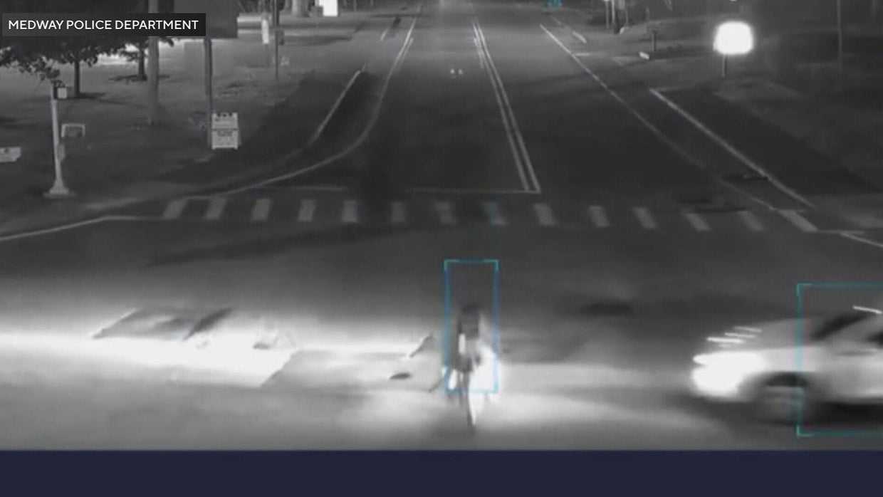 Video shows close call between e-bike and car in Massachusetts - CBS Boston