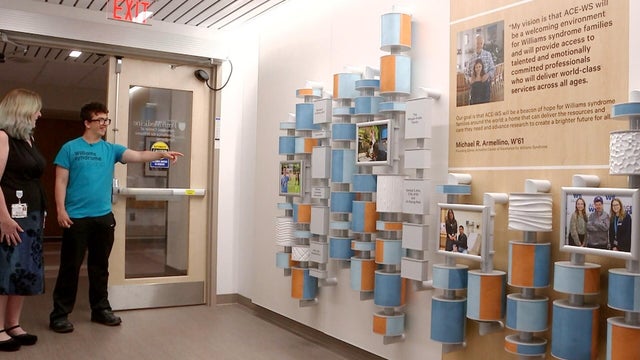 Rhys and Jocelyn Krebs walk into the new Williams syndrome center at Penn 