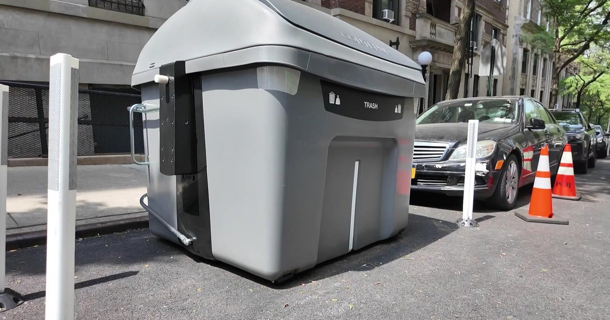 New bins in West Harlem keep away rats, but take up parking spots, some say 