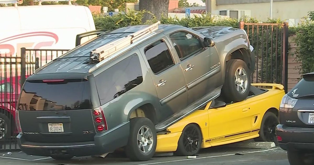 SUV drives onto other vehicle in Sacramento area apartment parking lot