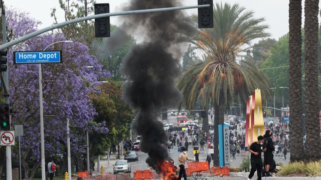 Protesters gather outside of the Federal Building in downtown Los Angeles 