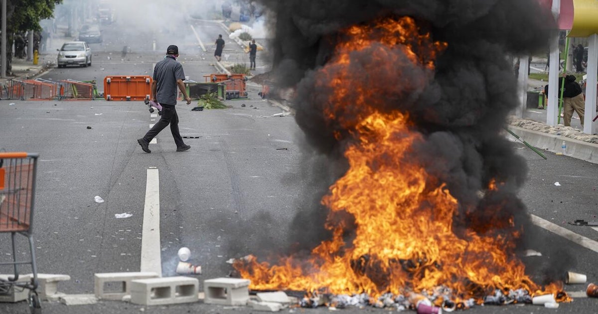 Los Angeles, Santa Ana protests spur charges for men accused of throwing Molotov cocktails, objects at officers 
