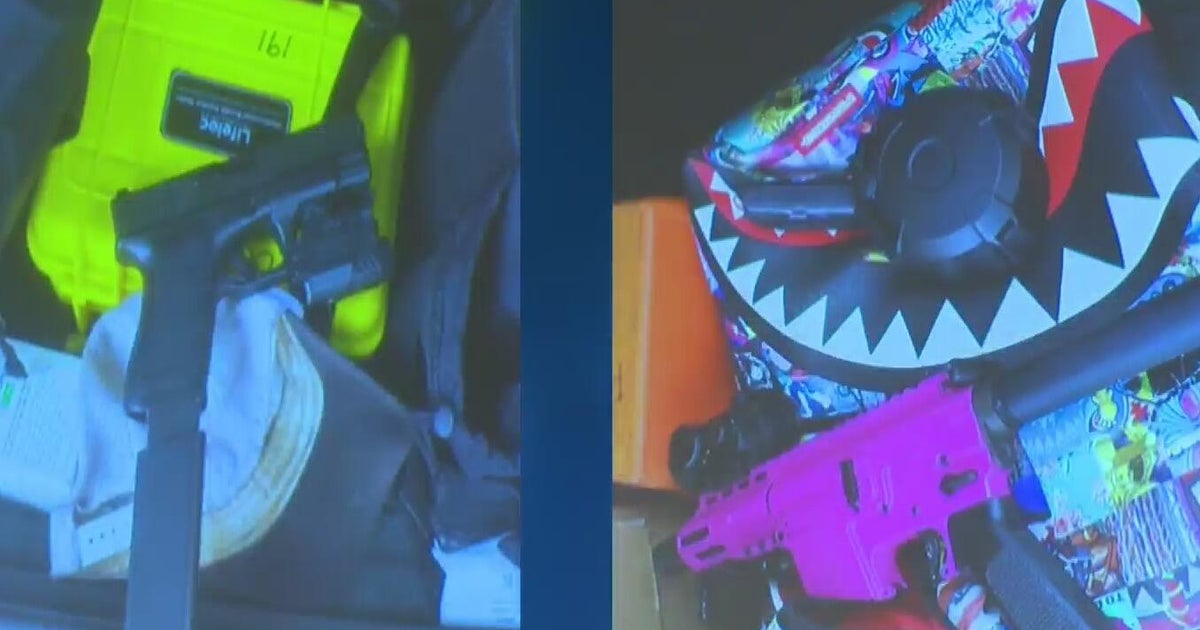 2 men charged after guns found outside high school graduation in ...