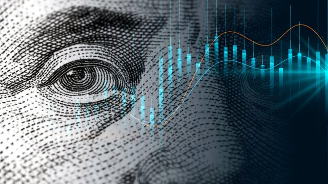Close up growth candle graph on digital screen. 