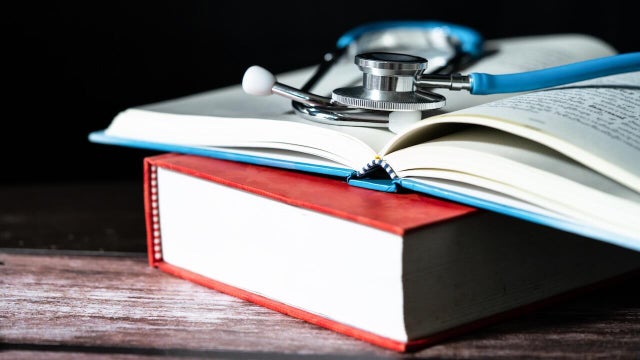 Medical stethoscope with books 