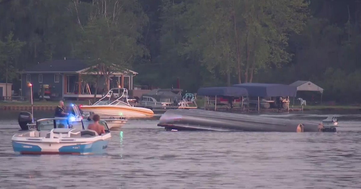 Adults, children rescued after pontoon boat flips over in Michigan lake 